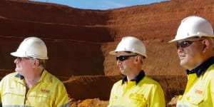 Lynas executives inspect their Mt Weld rare earths mine in WA in 2019.