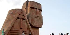 Tourists visit Grandmother and Granfather monument outside city of Stepanakert in Armenian-controlled Azerbaijani region of Nagorny Karabakh 