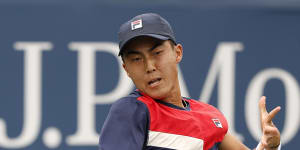 Australian Rinky Hijikata returns to Pavel Kotov in his round-one win at the US Open.