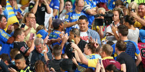 Jarryd Hayne with Eels fans after his NFL stint.