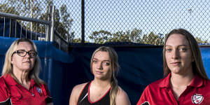 Leichhardt Wanderers Netball Club secretary Jenny Baker,with her daughters Hannah and Maddie,are among residents furious new sports courts will be closed for at least six months for construction of the WestConnex motorway. 