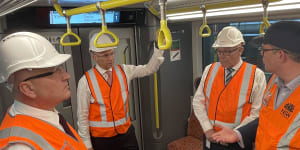 Minister for Transport and Veterans David Elliott,Treasurer and Minister for Energy Matt Kean,Minister for Finance and Employee Relations Damien Tudehope view the New Intercity Fleet,at Kangy Angy Maintenance Centre on Friday.