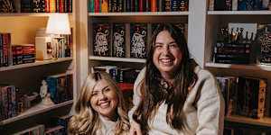 Larissa Chadwick,left,who runs a monthly book club dedicated to romance fiction,with best friend and fellow club member Reagen McKean.