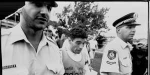 Diego Maradona is escorted off Wentworth Park after training with the Argentinian team in 1993.