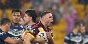 Billy Walters celebrates scoring for the Brisbane Broncos against the North Queensland Cowboys.