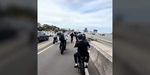 The group rode on the Harbour Bridge and city streets on Tuesday afternoon.