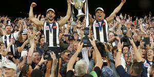 Brothers and Collingwood stars Josh and Nick Daicos celebrate the 2023 premiership.