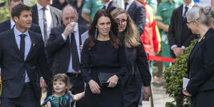 New Zealand Prime Minister Jacinda Ardern arrives with her husband Clarke Gayford and daughter Neve for the Queen’s State Memorial Service at the Cathedral of St Paul in Wellington in September.