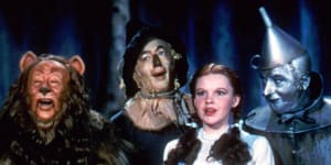 With Bert Lahr as the Cowardly Lion,Ray Bolger as the Scarecrow,Judy Garland as Dorothy,and Jack Haley as the Tin Woodman,the stars of “The Wizard of Oz” sing together in this scene from the 1939 MGM classic film.