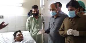 Mohammad Zubair,pictured in a hospital bed,survived the plane crash in Karachi.
