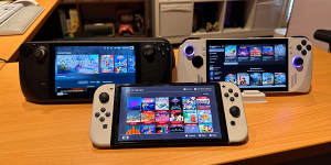 Valve’s Steam Deck (left) lets you take games from its online store with you,while the Nintendo Switch (front) is by far the most popular currently-sold video games machine.