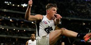 Last gasp:Jack Newnes takes his kick after the siren to seal the win over Fremantle in 2020.