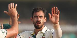 Mitchell Starc celebrates the wicket of Prabath Jayasuriya during day one.