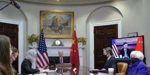 US President Joe Biden meets virtually with Chinese President Xi Jinping on Tuesday. 