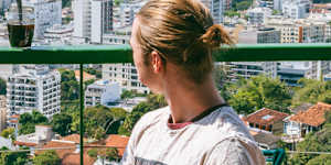 Travellers on a hotel balcony in Rio de Janiero.