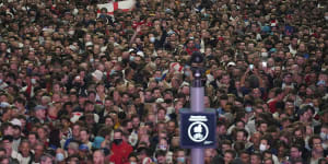 Fans celebrate outside Wembley Stadium after England qualified for the Euro 2020 final.