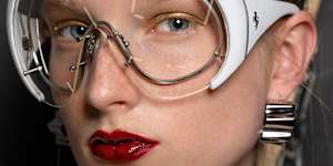 Mask sunglasses add a dash of F1 appeal on the catwalk at the Ferrari show for Milan Fashion Week 2024.