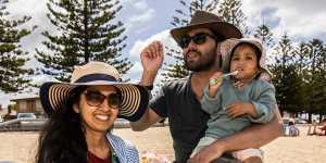 Ayesha Sunnooman,husband Mohammad and their daughter Zaynab on Altona Beach on Australia Day.