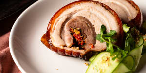 Lechon,stuffed with fragrant lemongrass and spice,is a sound rendition of a classic.