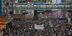 Protesters take to the streets of Causeway Bay in Hong Kong on January 1,2020. 