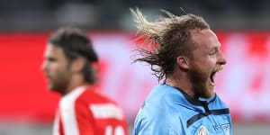 Grabbing the glory:Sydney FC's Ryan Grant celebrates his extra-time winner against Melbourne City.