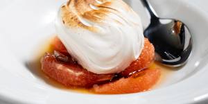 Glossy torched meringue with pink grapefruit and grapefruit caramel.