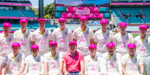 Former cricketer Glenn McGrath with the Australian squad at the SCG ahead of the pink Test.