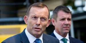  Prime Minister Tony Abbott and Premier Mike Baird at Granville on Sunday. 