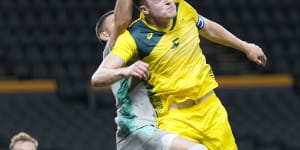 Socceroos centre-back Harry Souttar,right,in action at the Tokyo Olympics. 