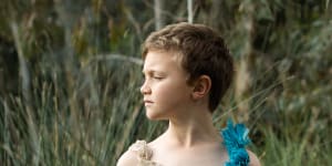 Photographer Daisy Noyes makes dresses out of rubbish she collects from the Merri Creek. She and her sons Marlow,6,and Augie,8,model them by the creek for her photo series on climate anxiety