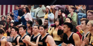 In this screen grab from the Disney+ movie Prom Pact,digital extras can be seen in the crowd,directly behind the basketball team.