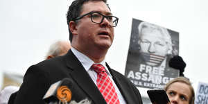Australian politician George Christensen has flown to London to visit WikiLeaks founder Julian Assange in prison after calling on the UK to block his extradition to the US.