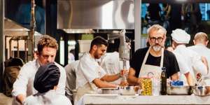 Massimo Bottura and his chefs at Refettorio Gastomotiva in Brazil.