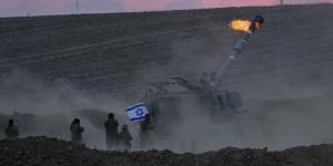An Israeli mobile artillery unit fires a shell from southern Israel toward the Gaza Strip,in a position near the Israel-Gaza border,Israel,Saturday,Oct. 14,2023. (AP Photo/Maya Allerruzzo)