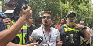 Avi Yemini,pictured at an Invasion Day rally in 2020,wants to find out who is behind the @PRGuy17 Twitter account so that he can pursue defamation against them.