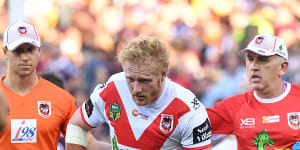 James Graham leaves the field after suffering a head knock in 2018.