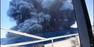 The eruption at White Island seen from a tourist boat.