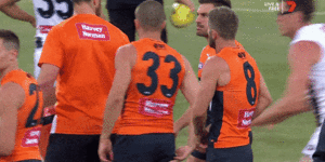Collingwood’s Mason Cox disrupts the Giants before their opening round clash.