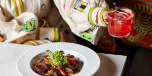 Kampot peppered wagyu beef bo luc lac with cherry tomatoes and capsicum.