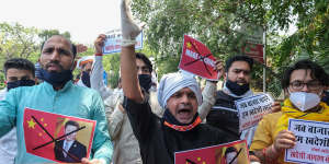 Activists from Swadeshi Jagran Manch,a wing of the Hindu nationalist organisation Rashtriya Swayamsevak Sangh (RSS),shout slogans during a protest outside the Chinese Embassy in New Delhi,India.