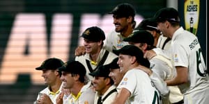 Australia’s players kick off their celebrations after winning the fifth Ashes Test in Hobart.