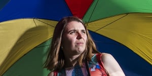 Lauren Davis,former President of Doctor Who Club of Australia. Her dress is a version of the Sixth Doctor’s outfit and she is pictured with a replica Dalek. 