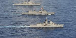 Australian,US and Japanese warships sail together in the South China Sea. The US wants to step up activity with its allies in the region.