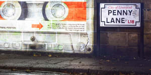 A mysterious cassette tape was projected onto a wall on Penny Lane to promote The Beatles’ announcement of the release of their “final” song ‘Now And Then’.