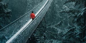 The Capilano Suspension Bridge sways 70 metres above the Capilano River.