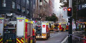 Firefighters,police and emergency services respond to a large building fire on Randle Street,Surry Hills.