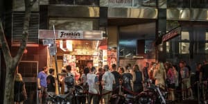 Night owls line up to get into Frankies as they celebrate the end of lockout laws on Tuesday night. 