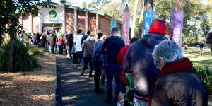 Voters line up outside a polling station in Sydney on Saturday.