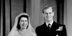 Princess Elizabeth,now Britain’s Queen Elizabeth II,and Lieutenant Philip Mountbatten,now Prince Philip,at Buckingham Palace after their wedding on November 20,1947.