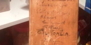 Rare bat with Bradman and Larwood's signature returned to Brisbane man